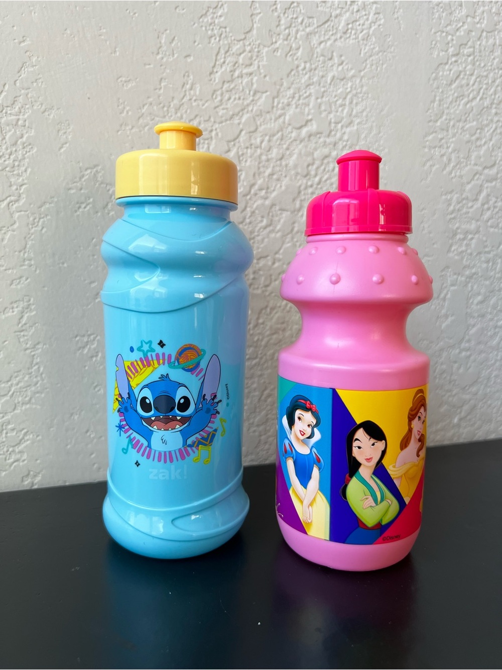 Bundle of 2 Kids Water Bottles - Blue Disney Stitch and Pink Princesses Patterns